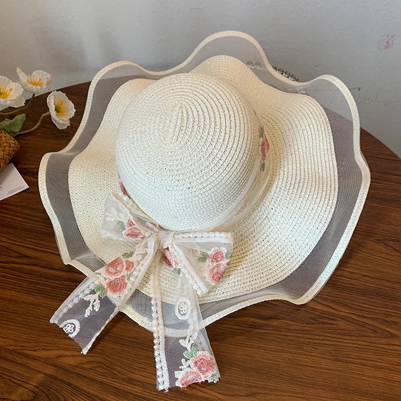 Women’s Elegant Wide Brim Straw Sun Hat – Summer Beach UV Protection, Adjustable & Foldable with Lace Bow for Outdoor Vacations