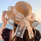 Women’s Elegant Wide Brim Straw Sun Hat – Summer Beach UV Protection, Adjustable & Foldable with Lace Bow for Outdoor Vacations