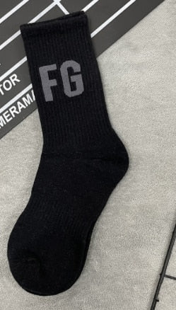 Men and women Essentials Socks Men free with your order of $75 and above
